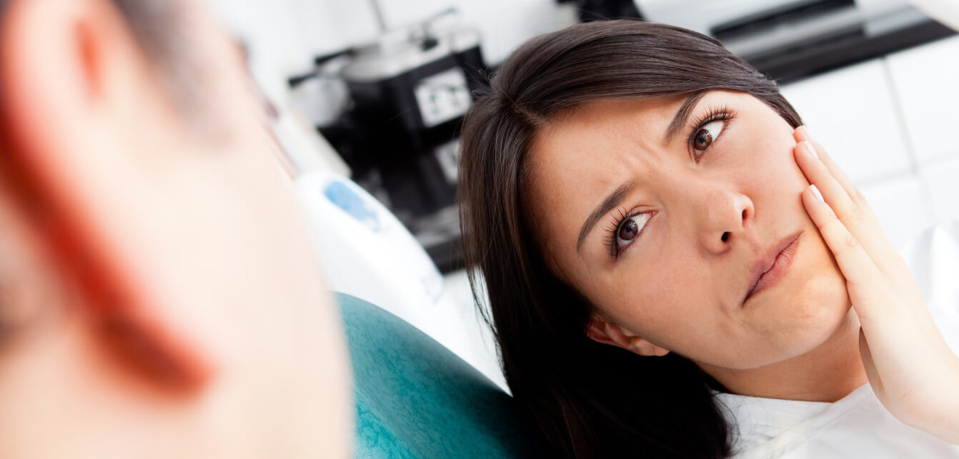 women patient having tooth pain