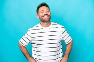 Middle aged man on blue background